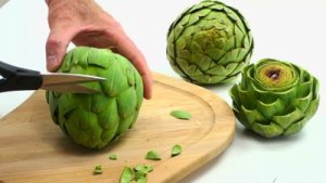 stock-footage--x-chef-prepares-artichoke-for-cooking